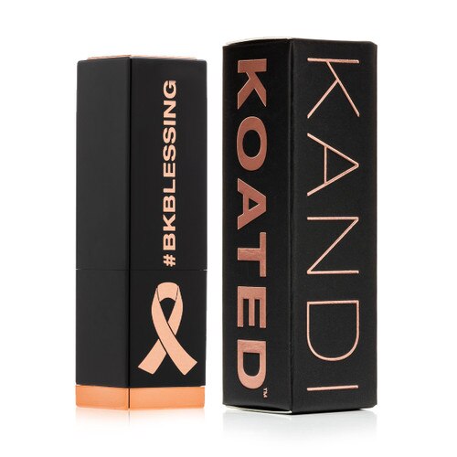 The BKBlessing lipstick tube beside a kandi koated lipstick box on a white background. The tube and box are both black with rose gold lettering.